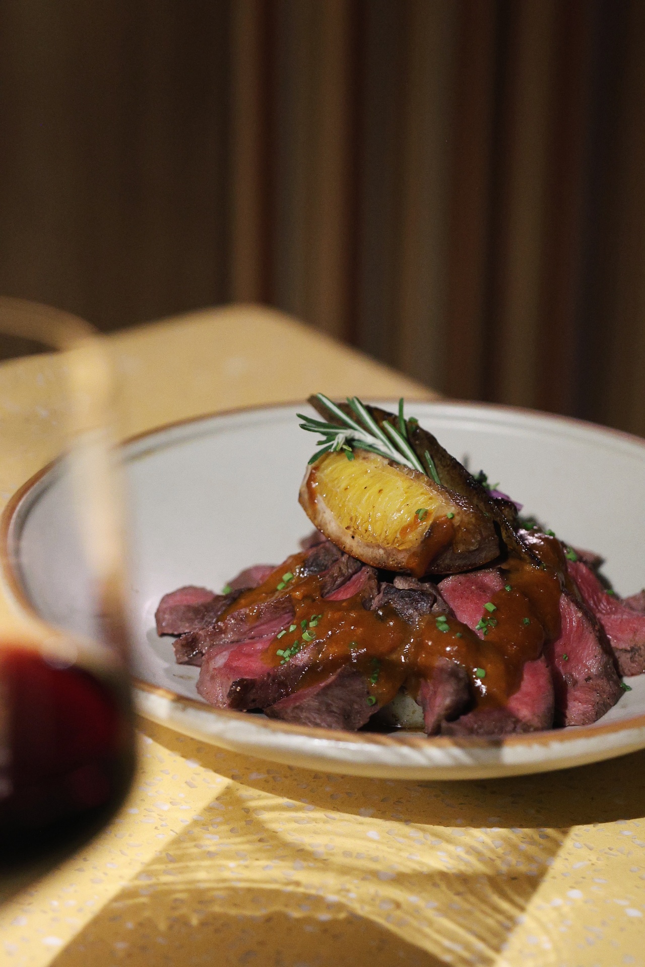 Seared steak with rosemary and red wine